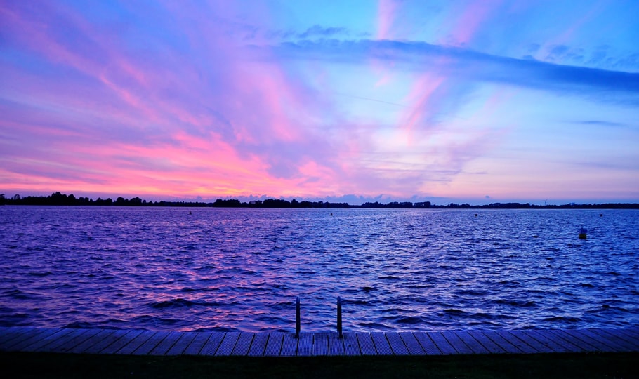 Purple horizon over a lake wallpapers