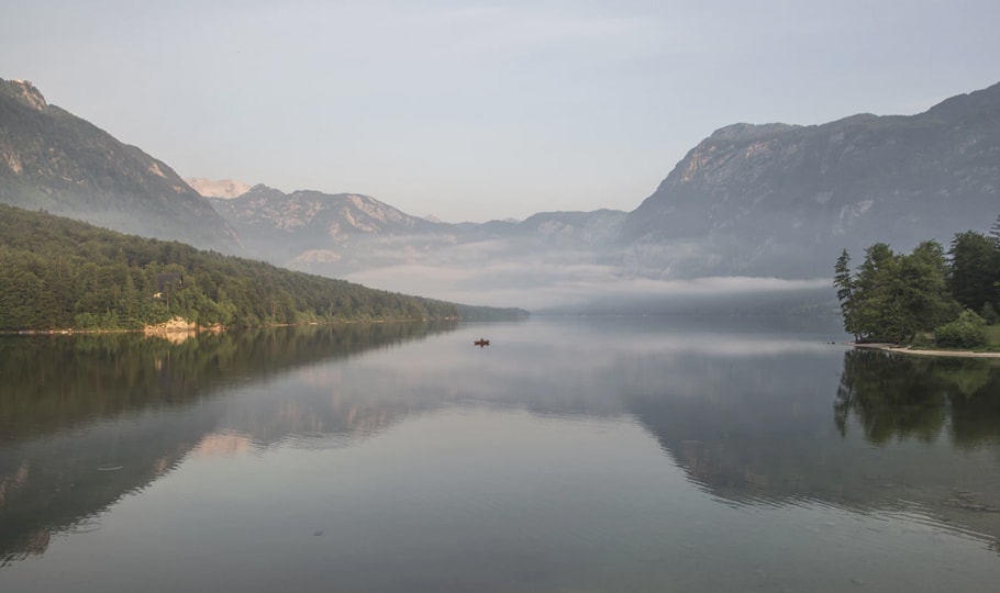 Tiny boat on a foggy river wallpapers